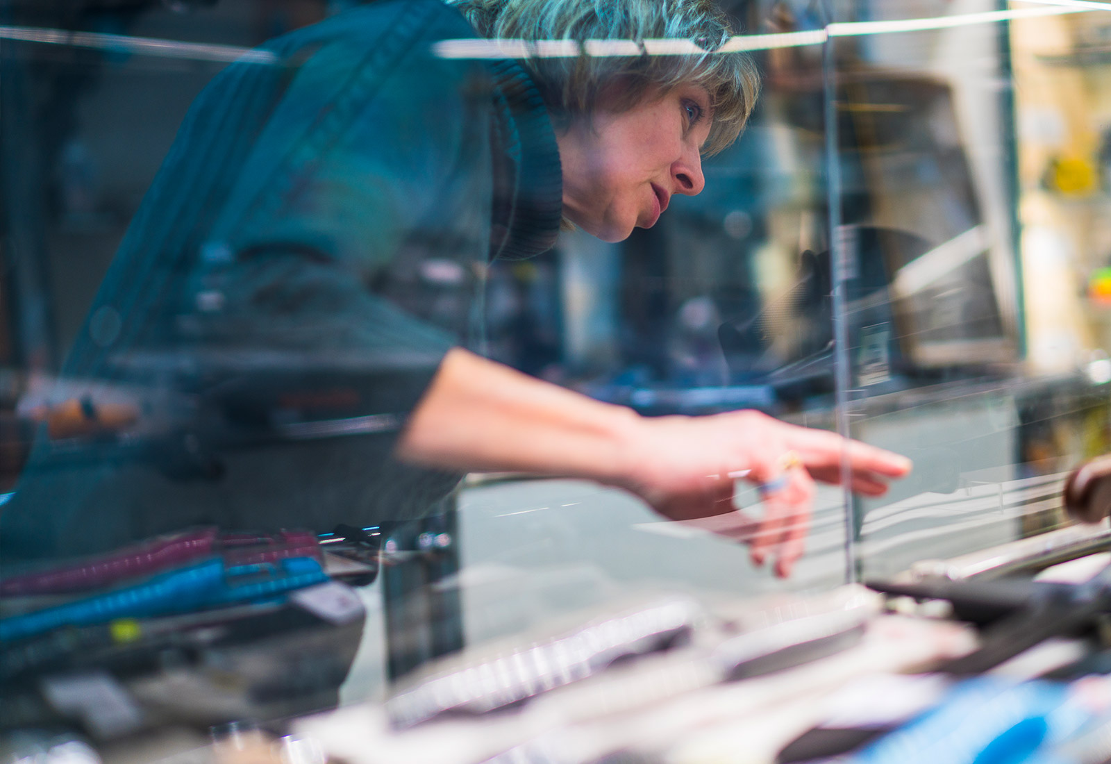 Lady looking at collection item