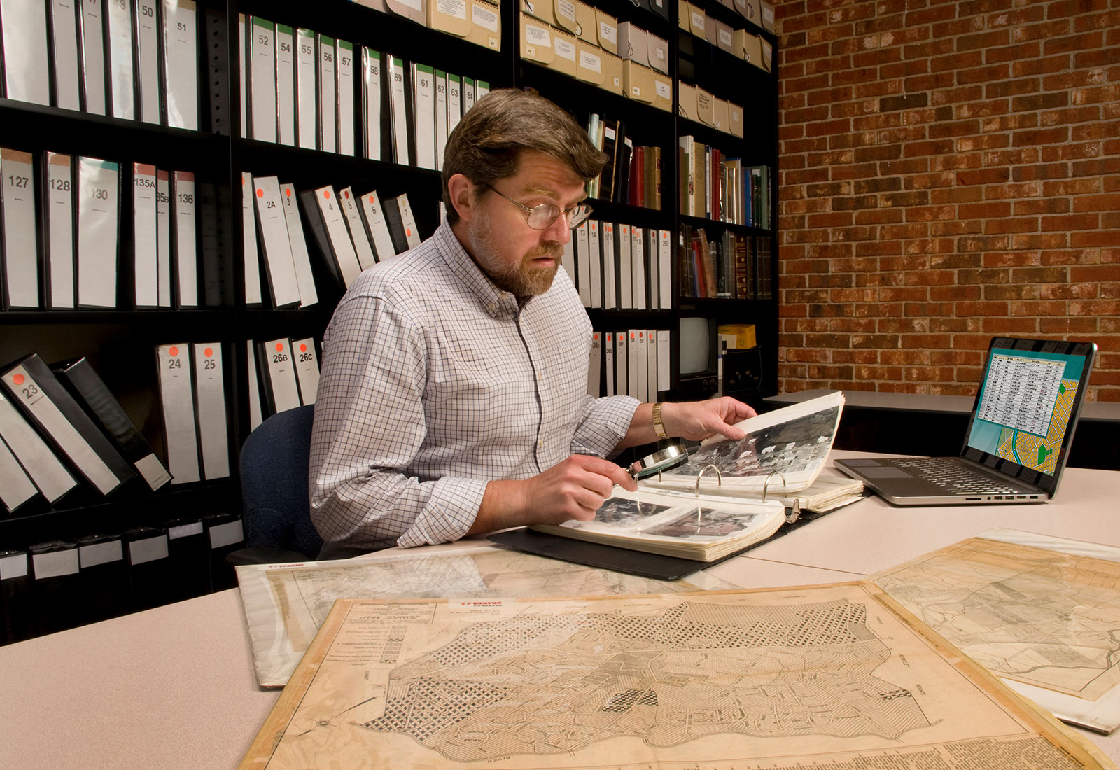 Man viewing archived pictures