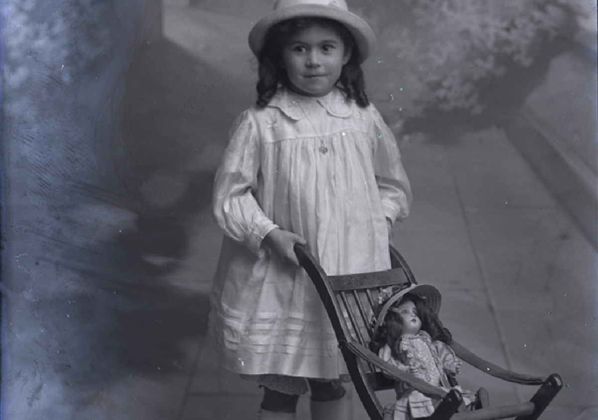 Sutton Archives Catalogue, Knights-Whittome Collection - young girl with pram glass plate scan