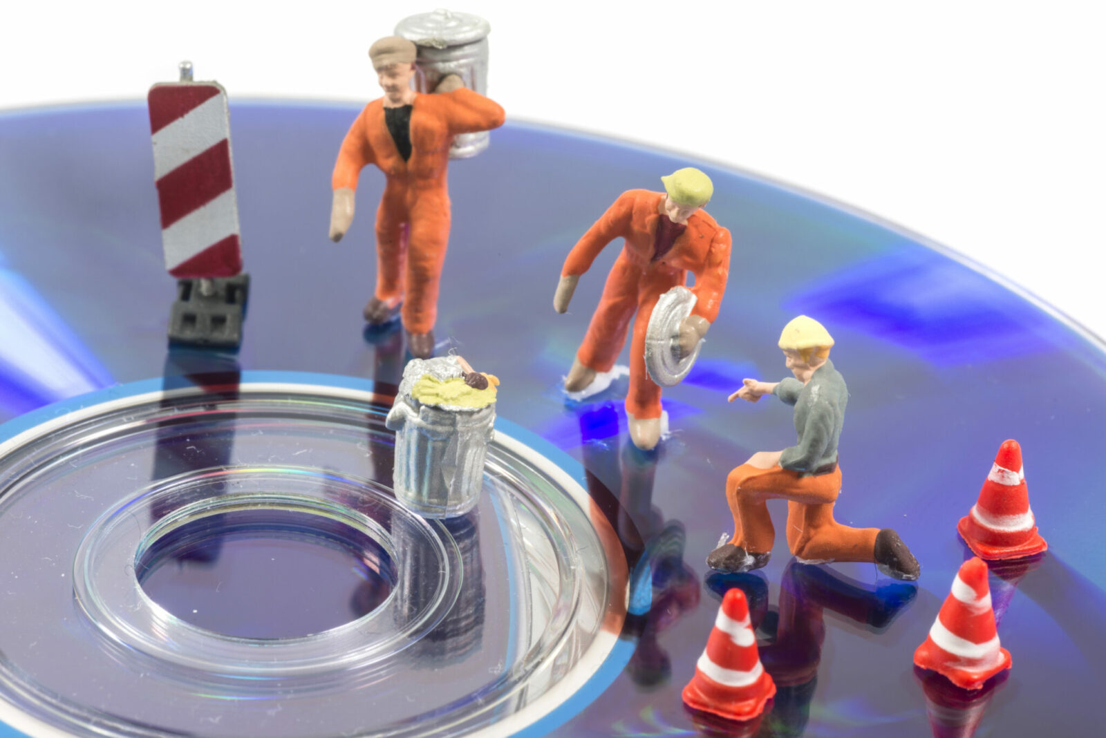 Little people repairing and cleaning the computer data