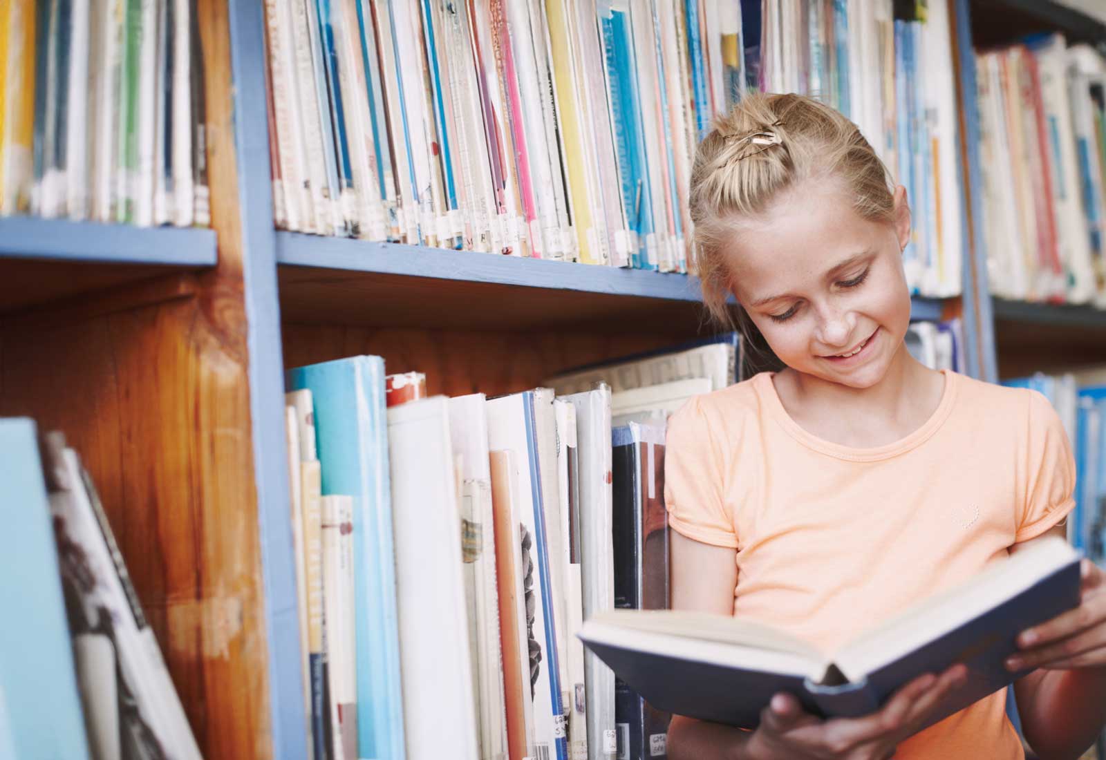 school-girl-in-library