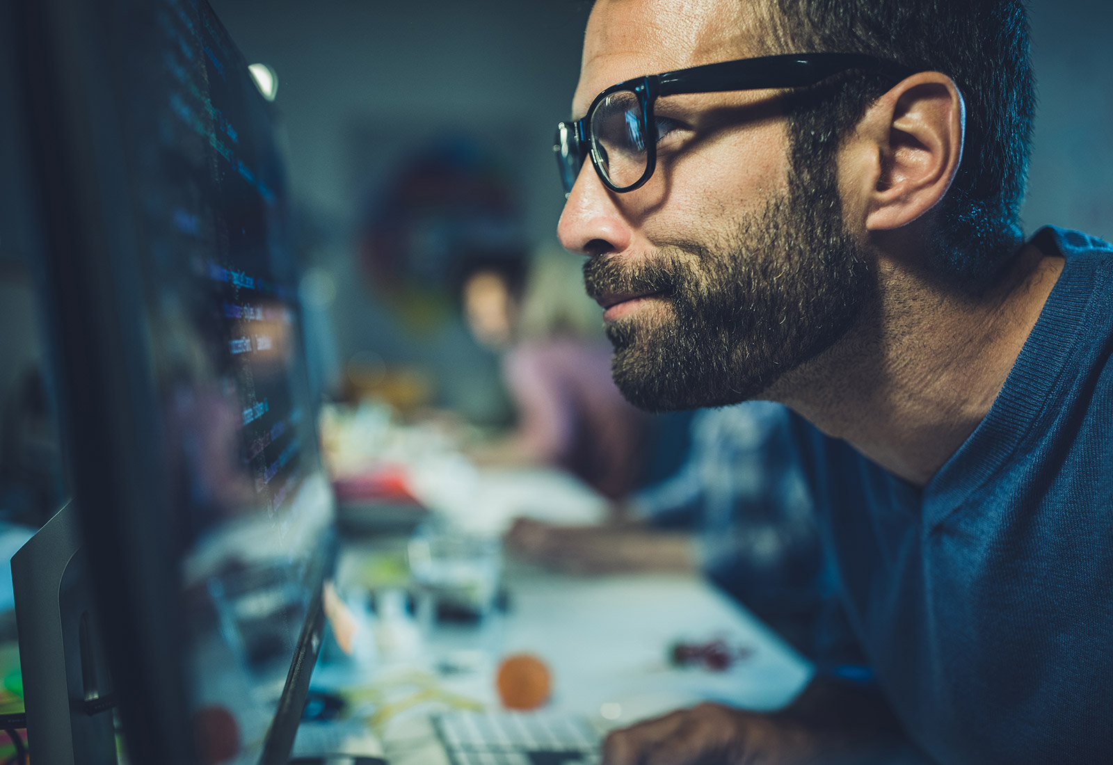 man looking at computer