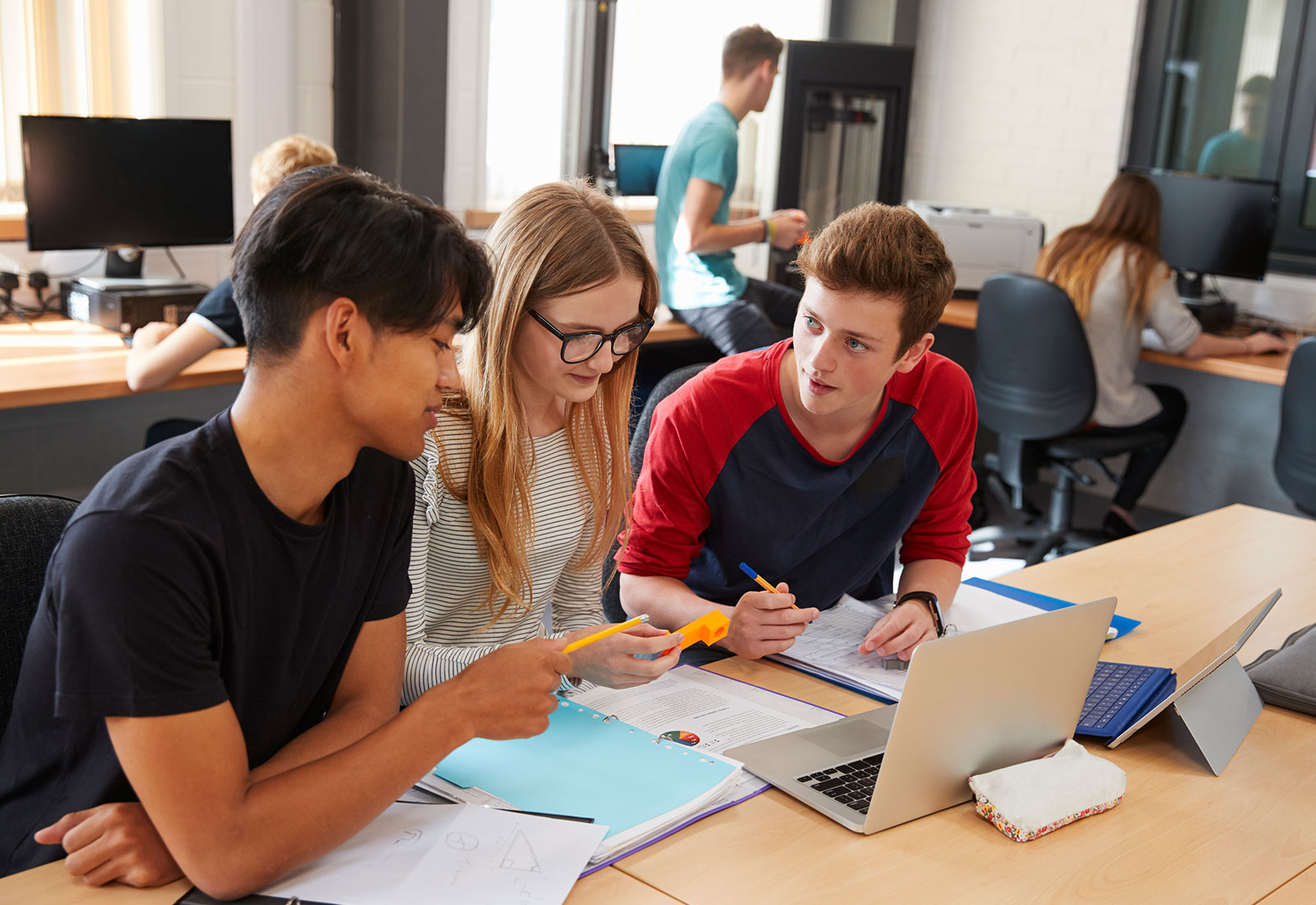 Students Using Laptop in Classroom