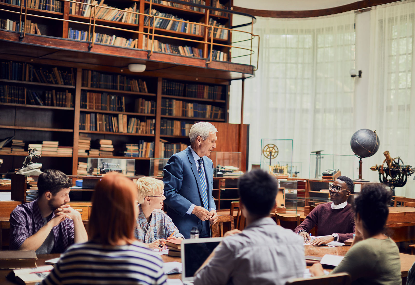 University Lecturer Teaching in Library